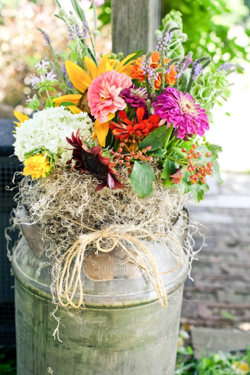 colorful flowers rustic milk can